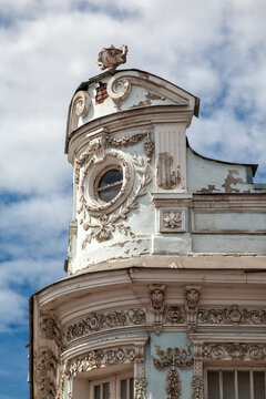 Ornate building corner under blue sky