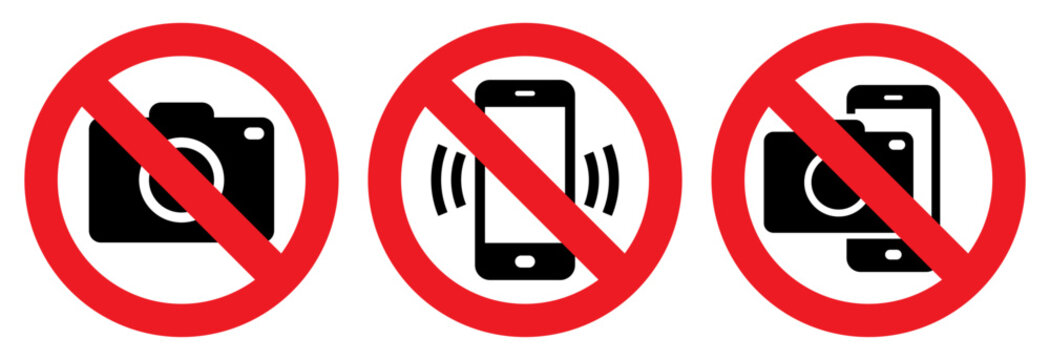 Warning signs - no phone, no camera, no camcorder. Mobile phone, taking photos and video prohibited.