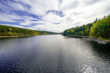 Fototapeta premium View of the Werda Dam near Falkenstein and the surrounding landscape. Nature near Werda in the Vogtland District. 