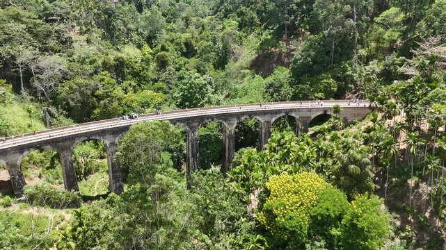 Aerial 4K drone footage of Ella in Sri Lanka. Cinematic bird's eye view of nine arch bridge in the Sri Lankan highlands.