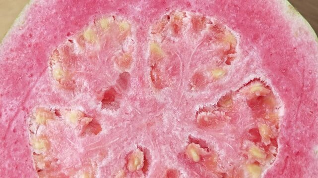 Pink guava on wooden board. 