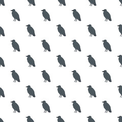 Fototapeta premium Black crow birds standing in a repeating seamless pattern