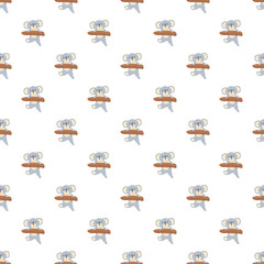Koala bears in a repeating cartoon pattern holding tree branches © nsit0108