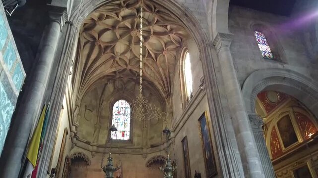 Intricate Baroque Ceiling Fresco and Gothic Architecture Inside a Historic European Cathedral
