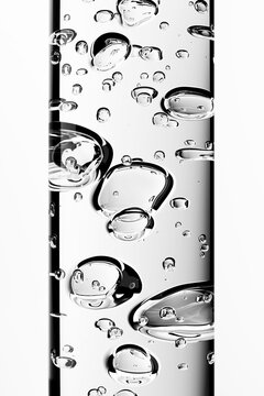 Transparent serum gel bubbles inside cosmetic tube with gotero and pipeta concept. Water texture for skin care, beauty cosmetics, hydration essence and clean skincare background.