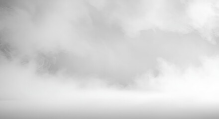Fototapeta premium Dense atmospheric mist blankets the foreground and background, creating a mysterious, empty white space suitable for design overlay or abstract concepts, gray, ethereal, volumetric