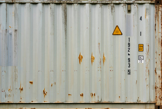 Weathered Industrial Shipping Container Metal Wall Texture, Detailed industrial shipping container wall texture featuring weathered painted steel, rust marks and corrugated metal surface. Perfect for 