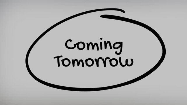 Coming Tomorrow Hand Writing Text on Glass Screen