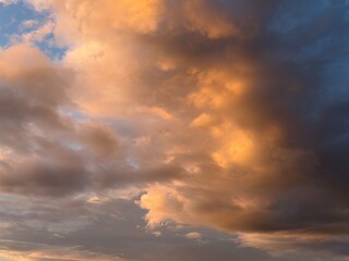Fototapeta premium Dramatic Golden Clouds Sunset Storm Sky in the evening