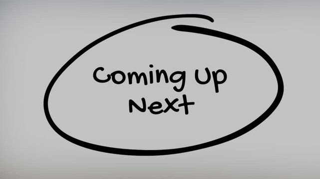 Coming Up Next Hand Writing Text on Glass Screen