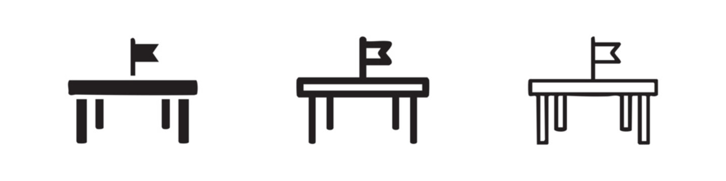 Table with flag icons: solid black, outline with fill, and outline