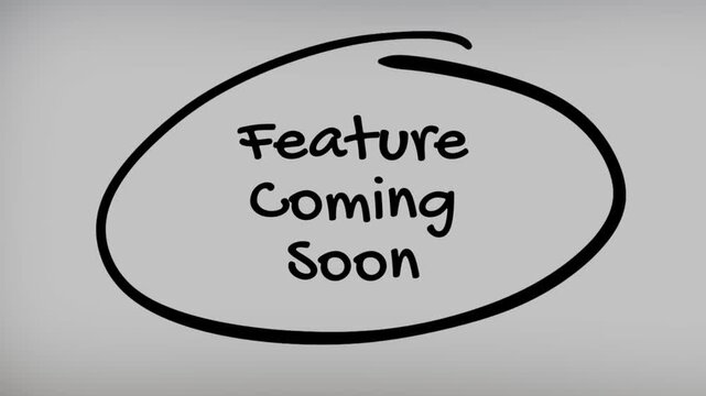 Feature Coming Soon Hand Writing Text on Glass Screen