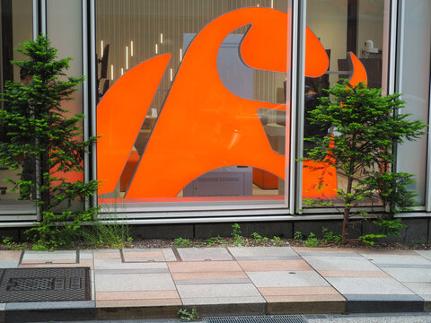 TOKYO, JAPAN - May 6, 2026: Detail of a branch of the investment platform company Moomoo in Tokyo.