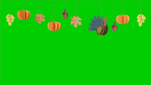 Colorful autumnthemed paper cutout decorations with turkey, pumpkins, and leaves on a vibrant green background