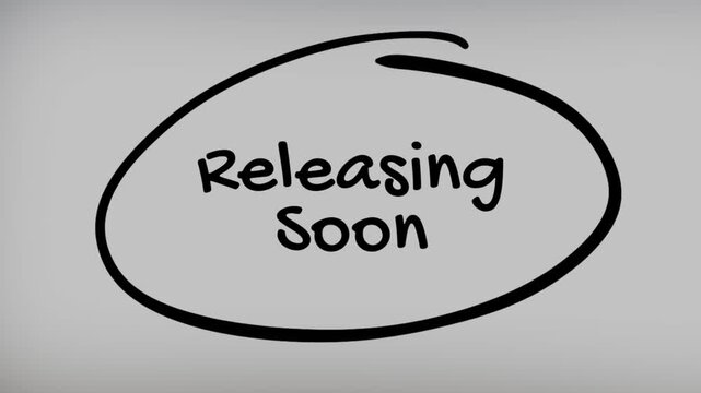 Releasing Soon Hand Writing Text on Glass Screen