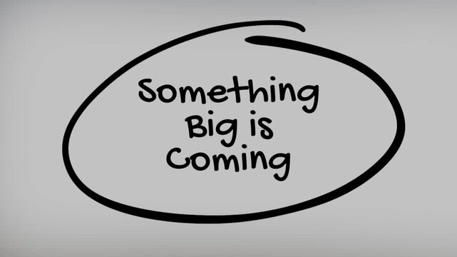 Something Big is Coming Hand Writing Text on Glass Screen