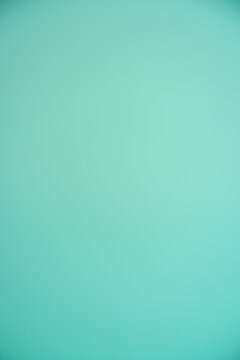 Smooth neo-mint color gradient background, soft light aesthetic backdrop.