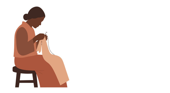 An African woman sitting on a wooden stool sewing fabric.