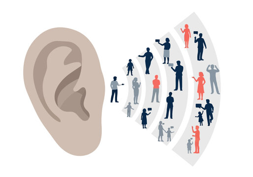 A large ear with people talking and gesturing around it in a noisy environment.