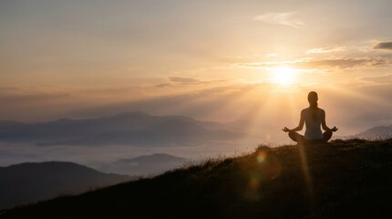 Obraz premium Young Woman Meditating in Yoga Lotus Pose at Sunset on Mountain Peak with Large Copy Space for Text