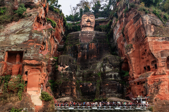 Leshan giant buddha carving into cliff in china
