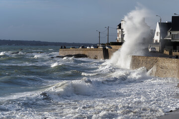 Blow of wind on the cornice of Concarneau, Brittany, France. © gildas