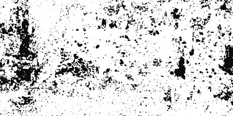 Fototapeta premium Black ink grunge texture with rough paint strokes, splatter marks, and distressed abstract white background effect.