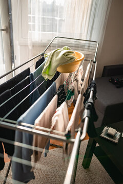 Drying laundry on a rack at home.