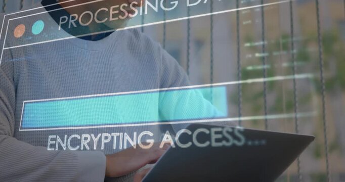 Man placing hands and typing on bench with laptop, starting tech HUD progress bars securing access
