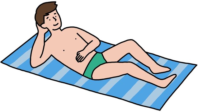 A man sunbathing on a striped beach towel