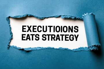 Fototapeta premium Execution Eats Strategy business wisdom on torn paper