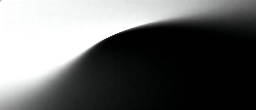 An abstract digital artwork showcasing a sleek, smooth gradient transition from bright white to deep black, creating an elegant visual flow and dynamic contrast with a subtle curve