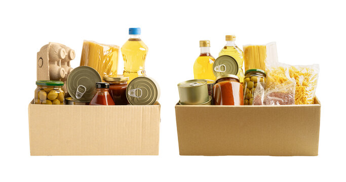 Foodstuffs in donation box isolated on white background.