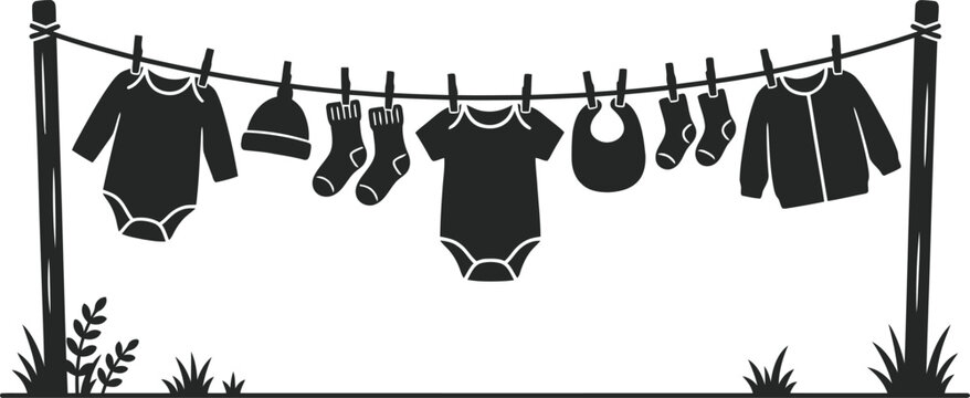 Baby clothes drying on a clothesline outdoors with clothesline, outdoors