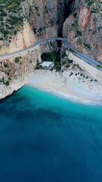 Experience the breathtaking coastline of Kaputas BeachKas, Turkey, where turquoise waters meet stunning cliffs.