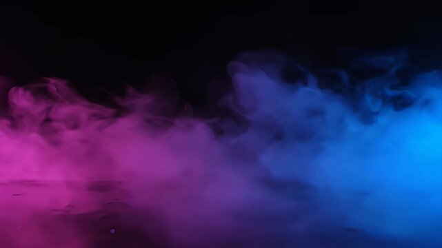Pink and blue neon smoke clouds on black background