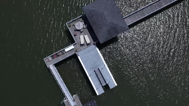 Aerial looking down on boat dock on Moon River in Savannah, GA used for fun in the sun while relaxing in summer