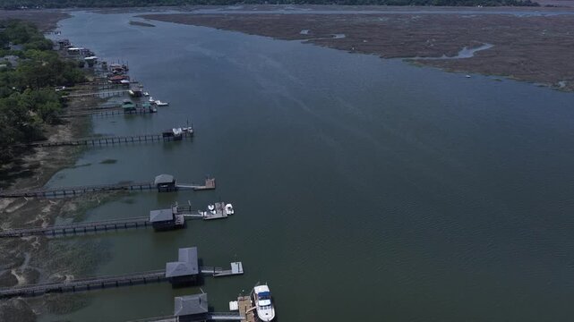 Living in homes and real estate by the Moon River in Savannah, Georgia with docks and natural wetland tidal marsh river