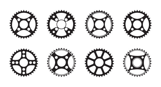 Assortment of sprockets and gears for mechanical engineering and industrial applications.