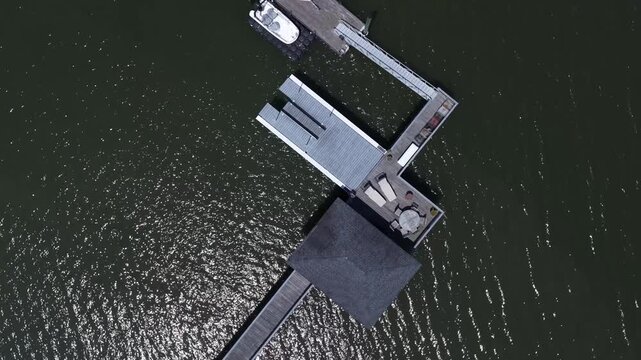 Aerial looking down on boat dock on Moon River in Savannah, GA used for fun in the sun while relaxing in summer
