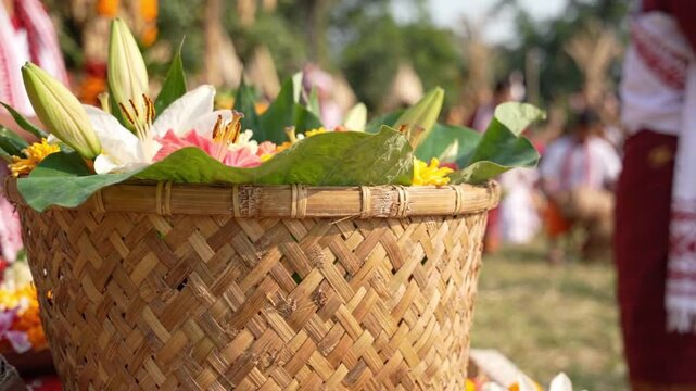 Traditional woven basket with flowers minimalist Moirang Haraoba concept