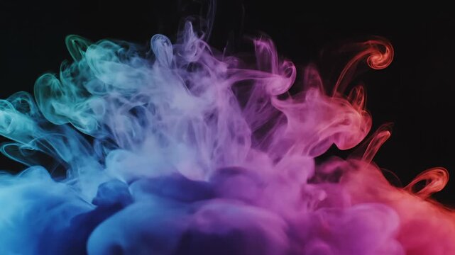 Abstrak Asap Warna Neon. Gambar menampilkan gumpalan asap atau tinta berwarna biru, ungu, merah muda, hijau, dan oranye yang menyatu membentuk komposisi dramatis di atas latar hitam, cocok untuk kebut