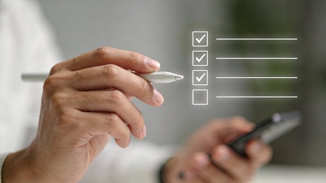 Hand checking list items with digital pen near mobile device, task management checklist concept, project planning and organization workflow, productivity tool for business