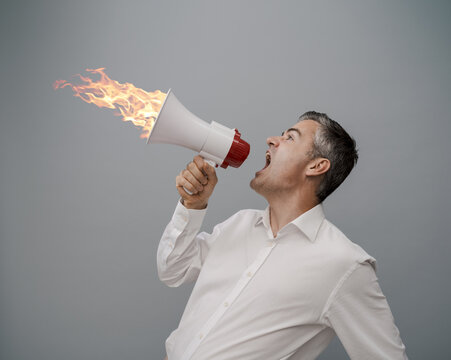 Man shouting with a megaphone