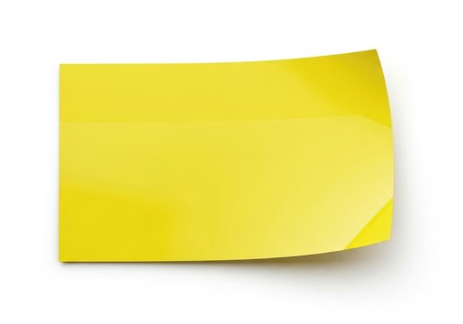 A bright yellow sticky note pad ready to be used for reminders or notes.