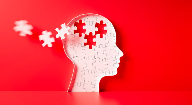 Head and brain diseases concept - missing pieces flying of the brain puzzle on red background with copy space
