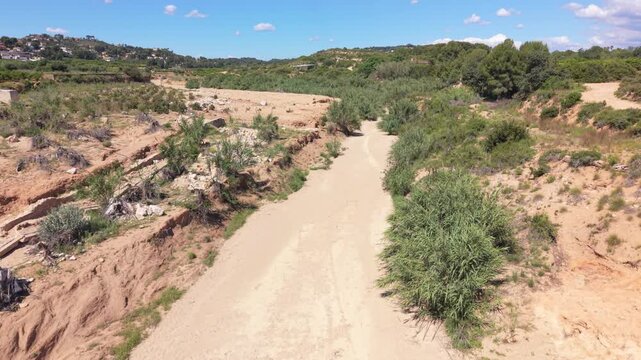 Drone view of a dry ravine, known as Barranco del Gallego in Chiva, Valencia Province, Spain