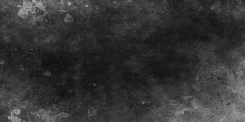 Obraz premium A dark and vintage black and white grunge background featuring a heavily textured old stone wall with a rough grey concrete surface and aged paper patterns for a dirty antique backdrop