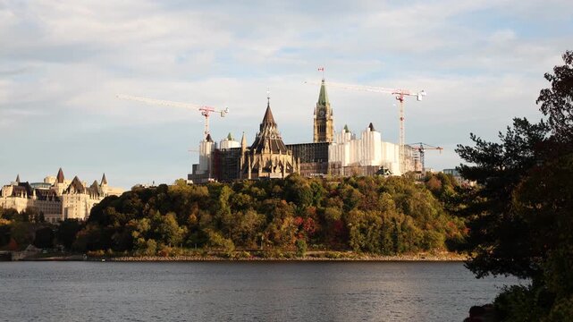Parliament Hill buildings restoration during autumn season in Ottawa, Canada.