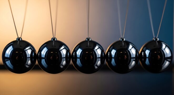 Newtons Cradle Balls Demonstrating Physics Principles.